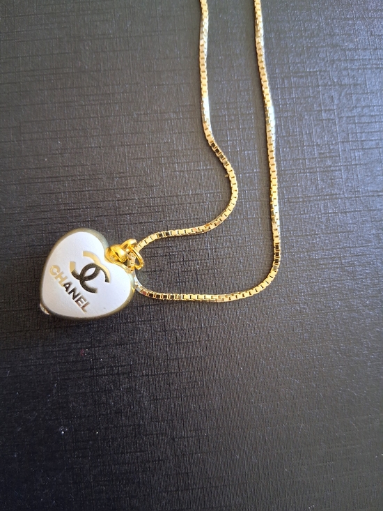 The Unbranded Brand Jewelry - Gold and White Heart Logo Pendant Necklace